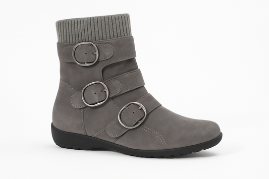 Professional product photo of gray suede boots