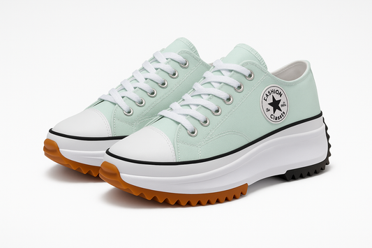 Professional product photo of mint green canvas sneakers