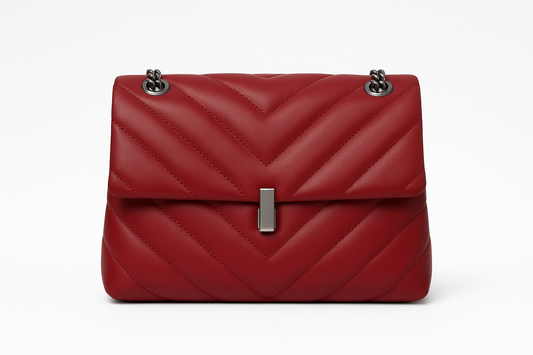 Professional product photo of red quilted leather handbag